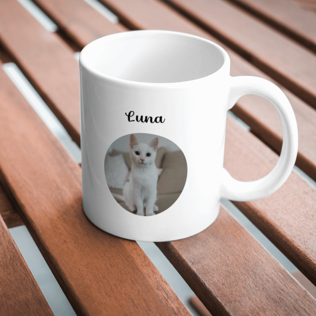 cat photo mug on table