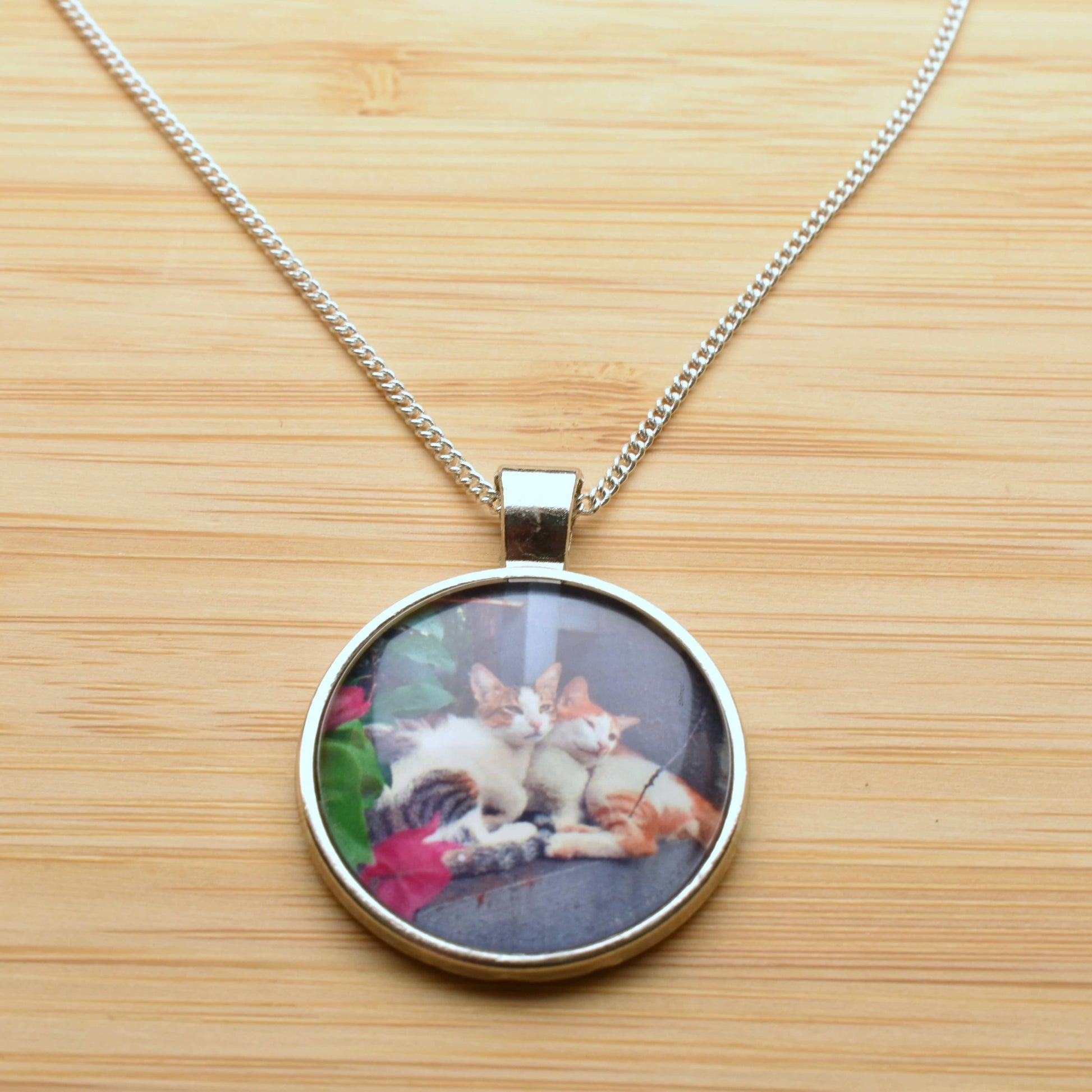 Photo pendant necklace two cats sleeping front view